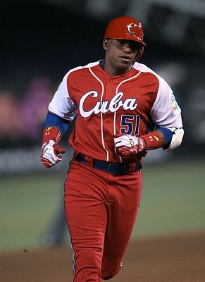 Cuba centerfield Cespedes runs after hitting his first home run against Team Australia during sixth inning in their World Baseball Classic game in Mexico City