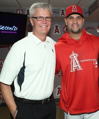 ANAHEIM, CA - JULY 02: (L-R) Pujols Family Foundation Executive Director/CEO Todd Perry, baseball great Albert Pujols and I Am Second Director of Strategic Partnerships Oscar Castillo attend a press conference for the latest short film by I Am Second at Angel Stadium of Anaheim on July 2, 2013 in Anaheim, California.  (Photo by Jesse Grant/WireImage)