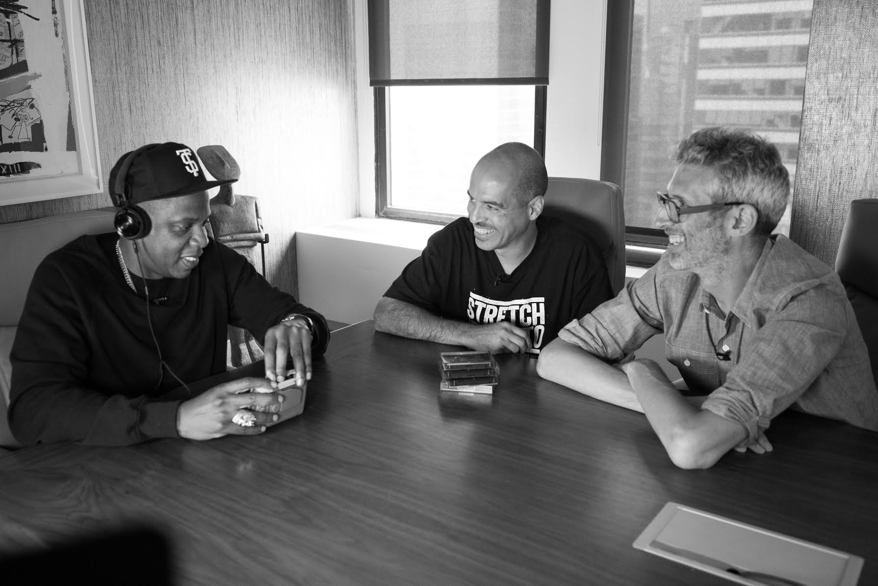 Jay-Z with Stretch & Bobbito listening to his rhymes on the show in the 90's from a cassette player. Photo by Matt McGinley