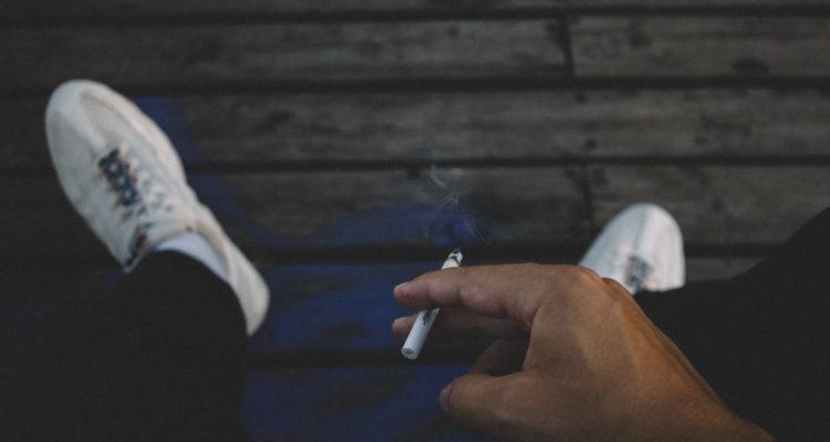 bad-habits-person-holding-cigarette-stick-1384654