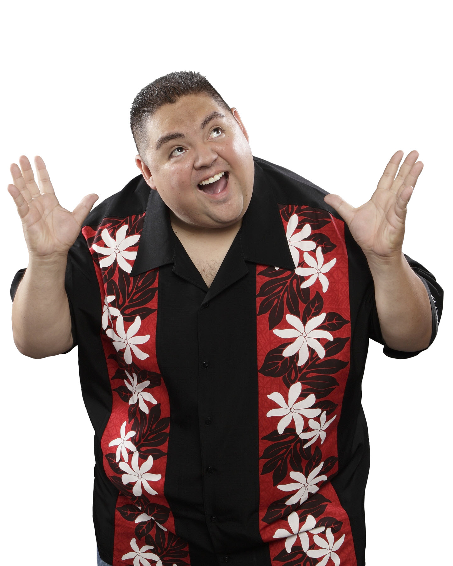 Comedian Gabriel Iglesias Fluffy laughing in black and red shirt