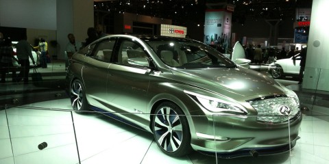 Infiniti Silver four door car 3