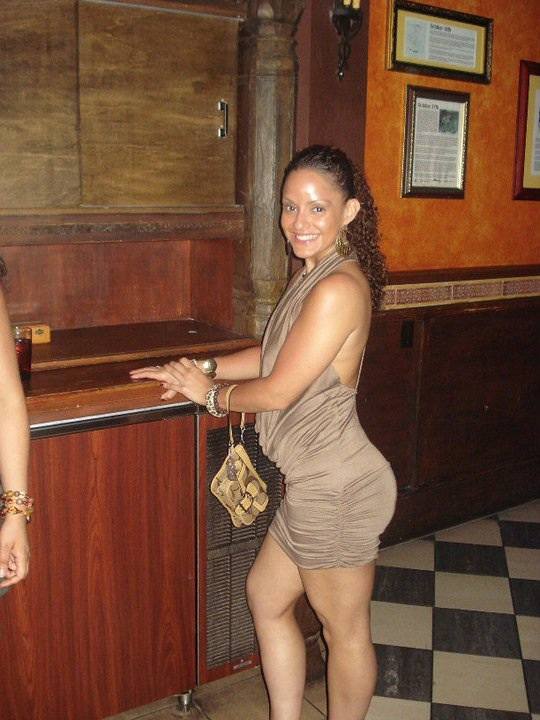 Tiffany Cruz in brown dress