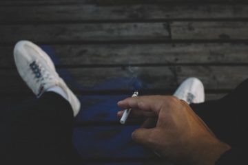 bad-habits-person-holding-cigarette-stick-1384654