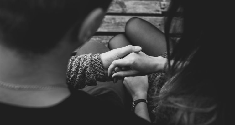 relationships-close-up-of-couple-holding-hands-326650